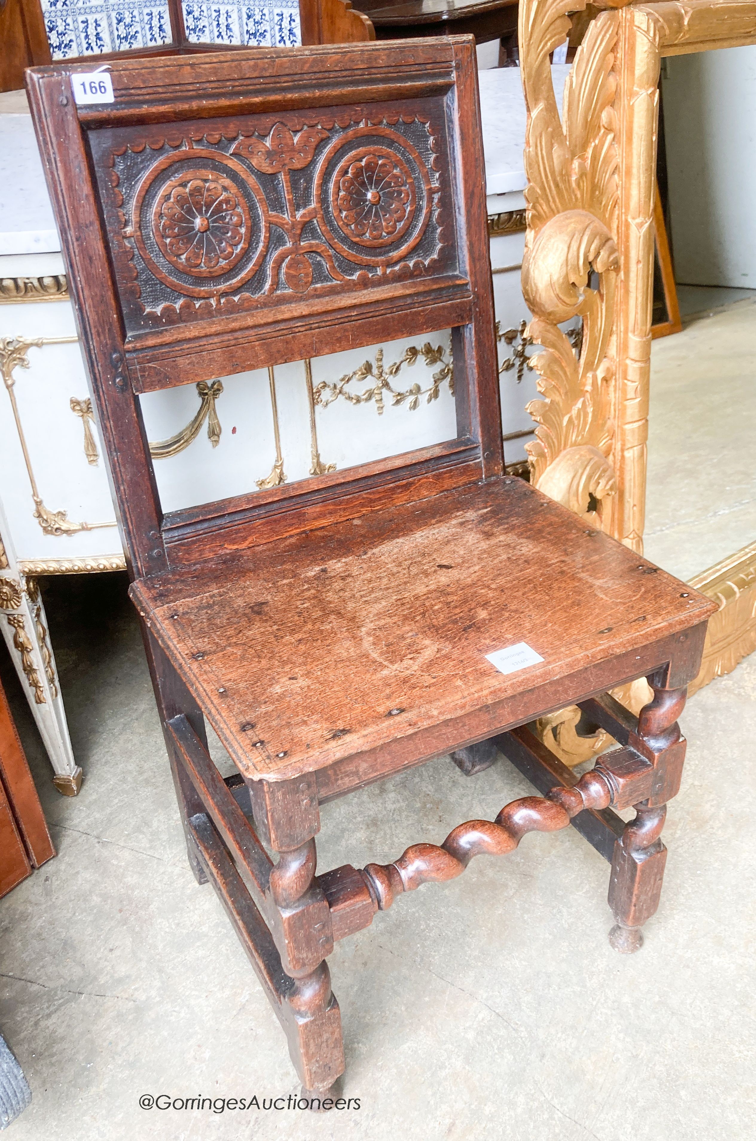 A late 17th century oak back stool, length 46cm, depth 38cm, height 91cm